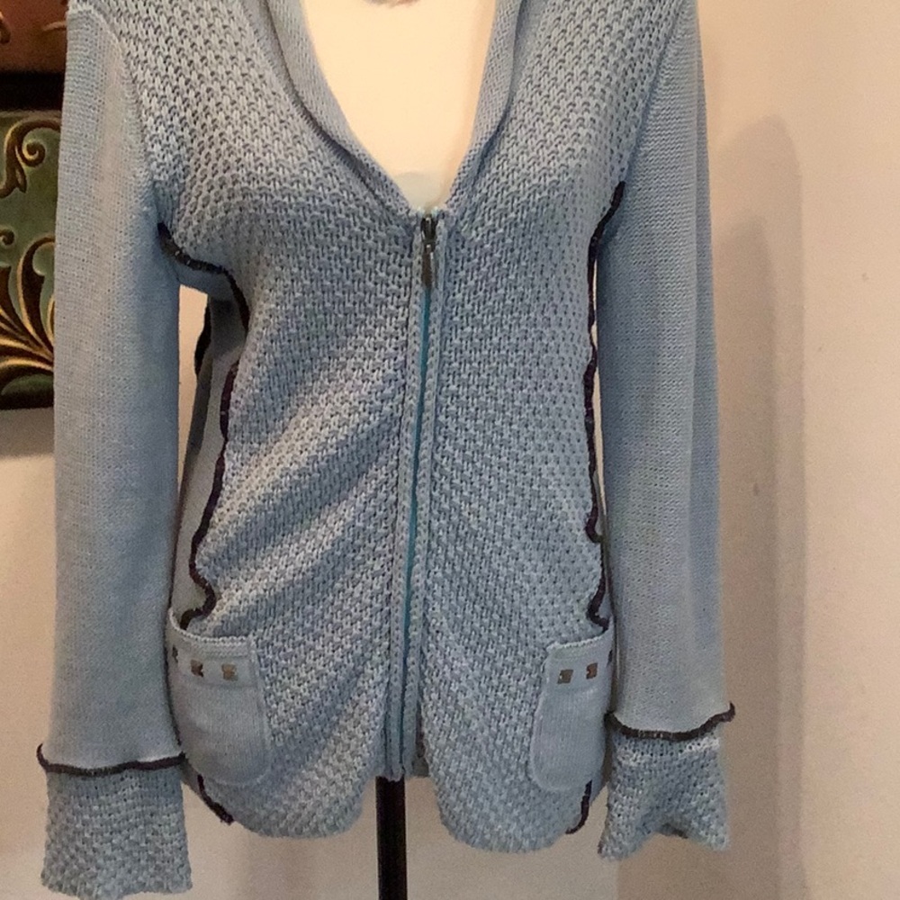 Orly Cardigan zip up with black accents. size Medium